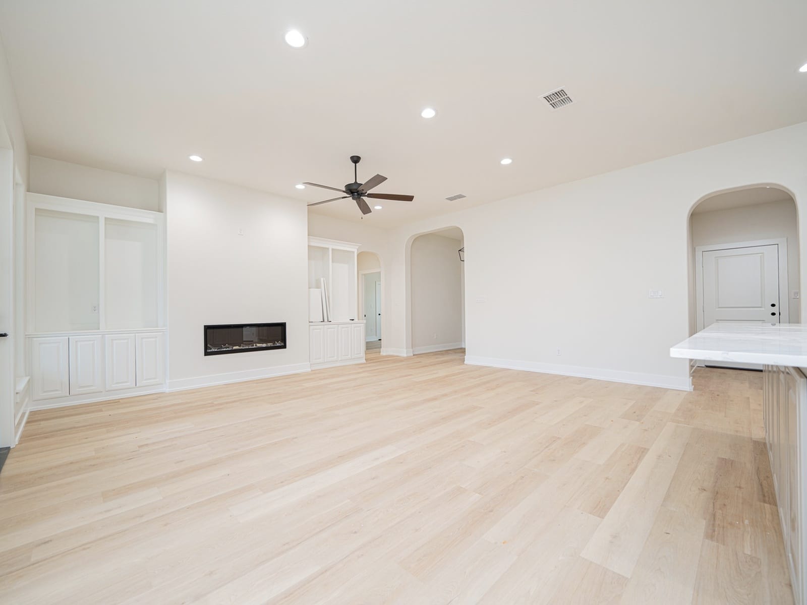longview-custom-home-builder-modern-open-living-space-with-fireplace